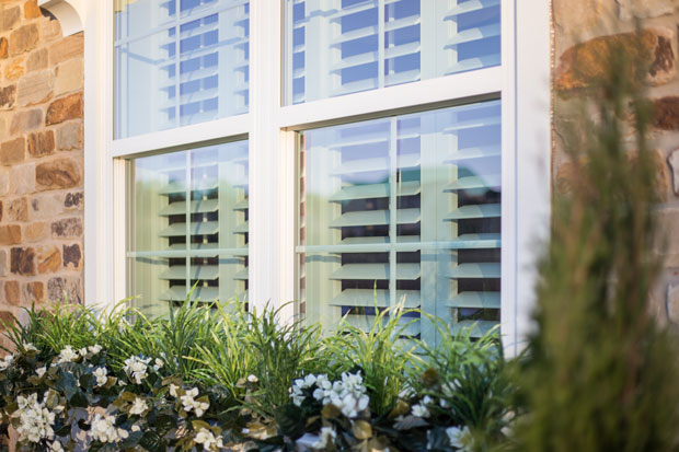 Plantation shutters on a home window